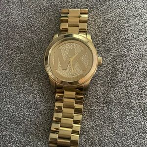 Gold MK watch